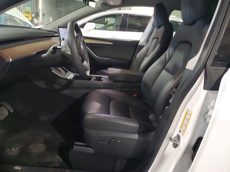 2023 Tesla Model y VIN 7SAYGDEE1PA066305 COPART salvage auction — REAR END, IA - CERT OF TITLE-SALVAGE TITLE, sold $200 on 2026-07-29 (photo 7)