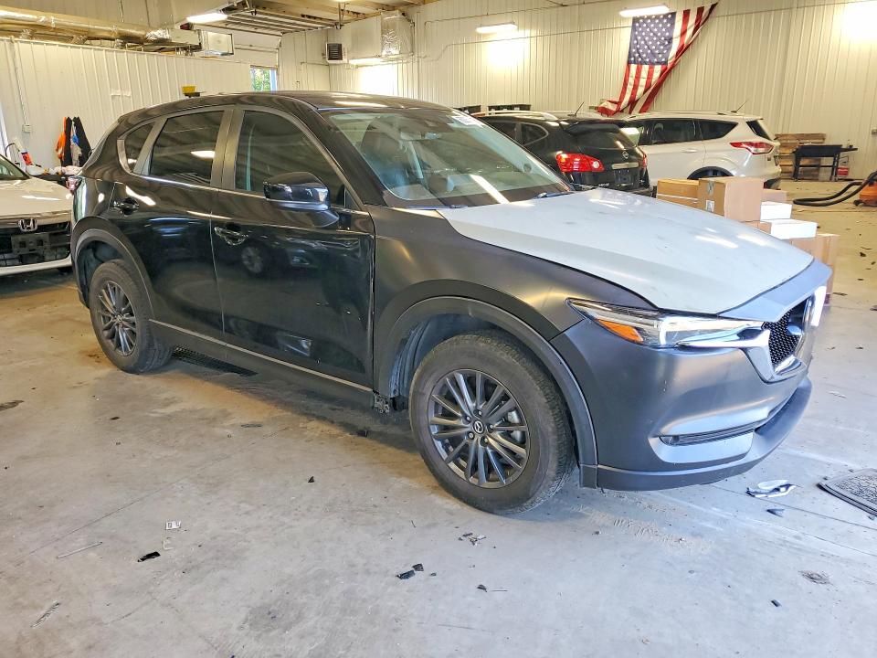 2021 Mazda Cx-5 VIN JM3KFACMXM1394822 COPART salvage auction — SIDE, Salvage Title, sold $4,000 on 2026-07-09 (photo 4)