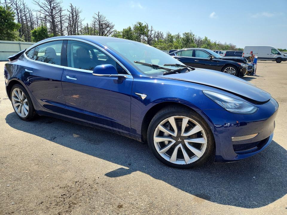 2018 Tesla Model 3 VIN 5YJ3E1EBXJF116047 COPART salvage auction — REAR END, Ny - Mv-907A Salvage Certificate, sold $1,700 on 2026-07-20 (photo 4)