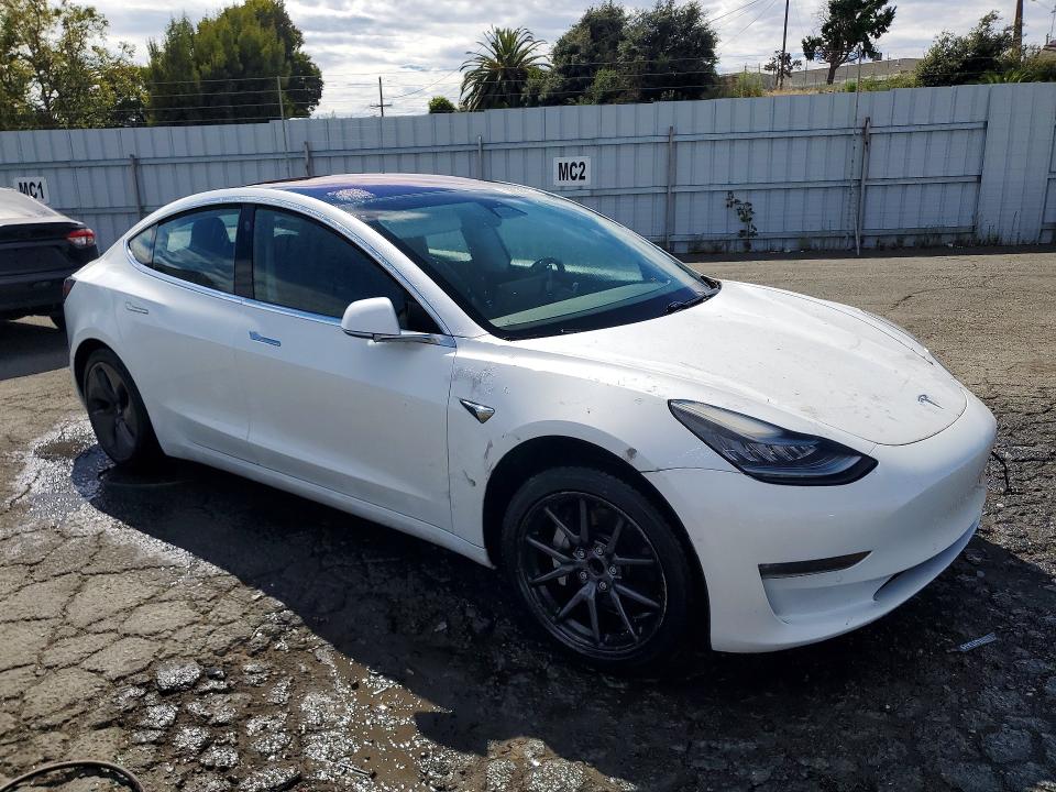 2018 Tesla Model 3 VIN 5YJ3E1EA1JF013218 COPART salvage auction — MINOR DENT/SCRATCHES, Ca - Certificate Of Title, sold $17,007 on 2026-09-01 (photo 4)