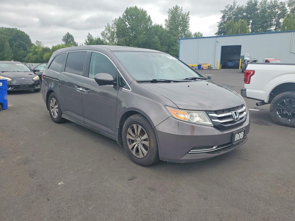 2015 Honda Odyssey VIN 5FNRL5H65FB017245 COPART salvage auction — NORMAL WEAR, Salvage Title, sold $1,050 on 2026-07-28 (photo 4)