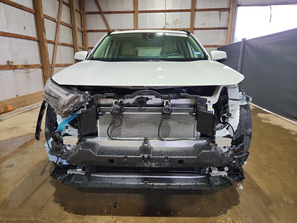 2023 Toyota Rav4 VIN JTMMWRFV9PD205469 COPART salvage auction — FRONT END, TX - CERTIFICATE OF TITLE, sold $800 on 2026-07-21 (photo 5)