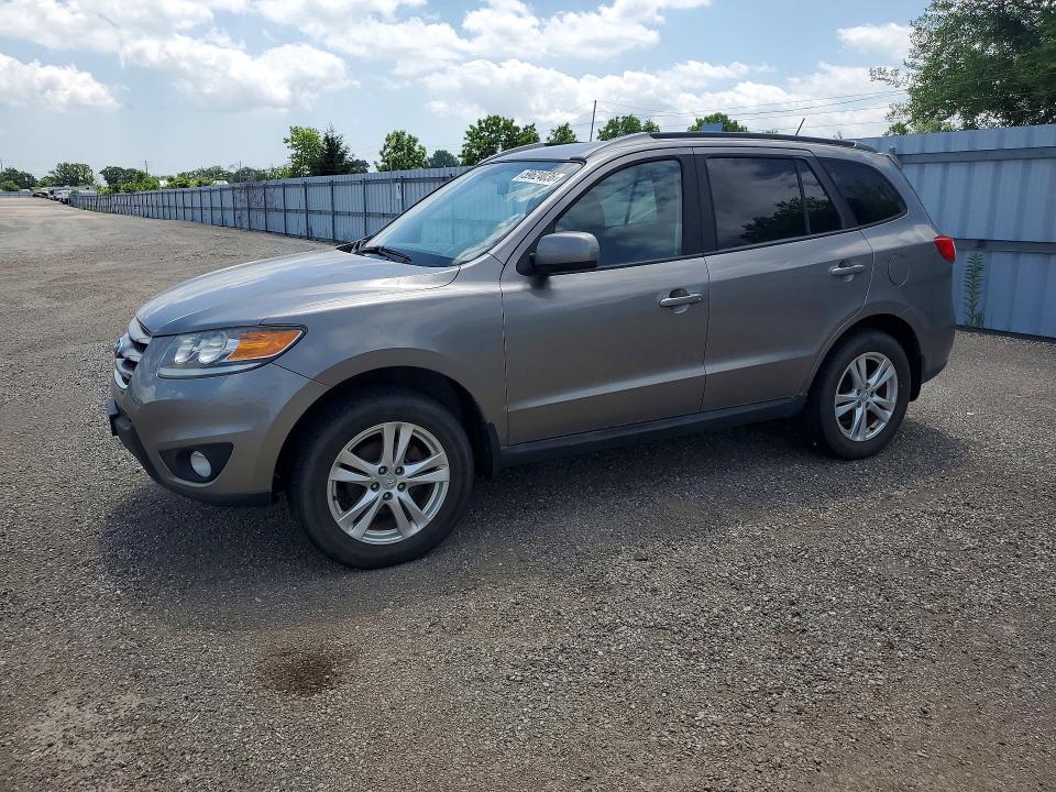 2012 Hyundai Santa fe VIN 5XYZGDAB1CG093748 COPART salvage auction — MINOR DENT/SCRATCHES, On - Permit No Brand - Unfit, sold $250 on 2026-07-21 (photo 1)