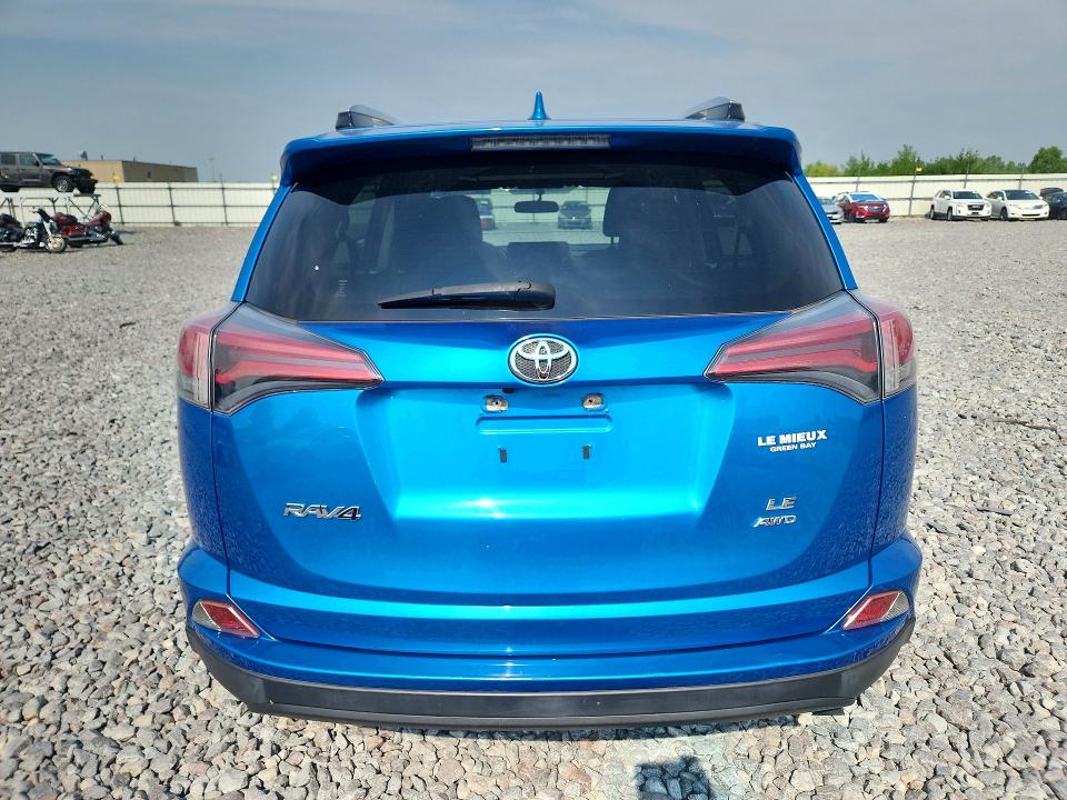 2016 Toyota Rav 4 VIN JTMBFREV3GJ056356 COPART salvage auction — WATER/FLOOD, WI - CERTIFICATE OF TITLE, sold $5,100 on 2026-07-20 (photo 6)