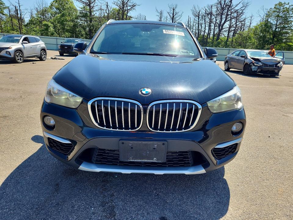 2018 BMW X1 VIN WBXHT3C37J5F89916 COPART salvage auction — REAR END, Ny - Mv-907A Salvage Certificate, sold $4,100 on 2026-07-13 (photo 5)