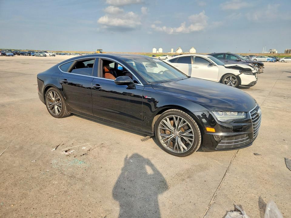 2016 Audi A7 VIN WAU2GAFCXGN000822 COPART salvage auction — MINOR DENT/SCRATCHES, La - Dealer Only Clean Title (P), sold $7,600 on 2026-08-18 (photo 4)