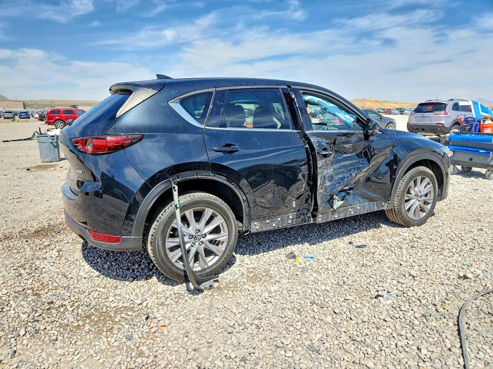 2019 Mazda Cx-5 VIN JM3KFBDY9K0663404 COPART salvage auction — SIDE, Salvage Title, sold $6,100 on 2026-08-21 (photo 3)