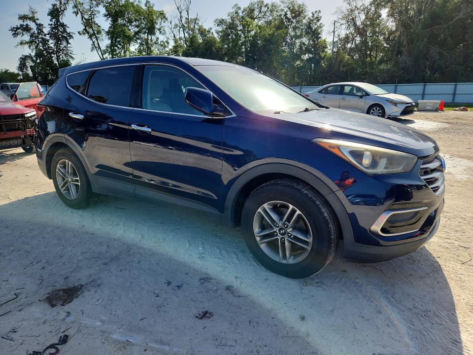 2017 Hyundai Santa fe VIN 5XYZT3LB9HG409567 COPART salvage auction — MECHANICAL, Fl - Certificate Of Title, sold $2,300 on 2026-07-28 (photo 4)