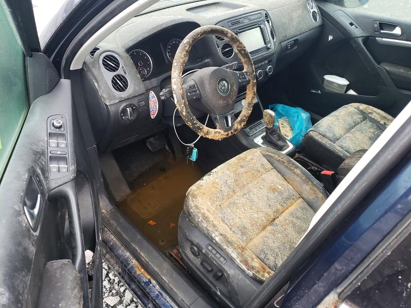 2014 Volkswagen Tiguan VIN WVGJV3AXXEW624990 COPART salvage auction — WATER/FLOOD, Ns - Cert Of Registration, sold $225 on 2026-08-13 (photo 8)