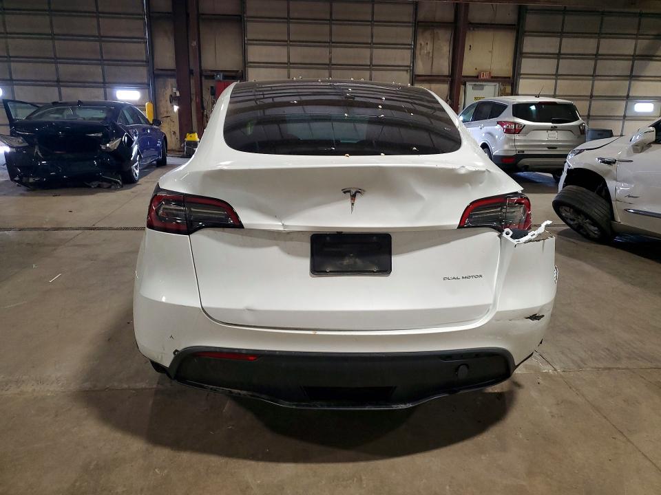 2023 Tesla Model y VIN 7SAYGDEE1PA066305 COPART salvage auction — REAR END, IA - CERT OF TITLE-SALVAGE TITLE, sold $200 on 2026-07-29 (photo 6)