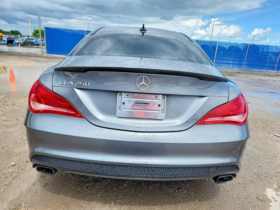 2014 Mercury VIN WDDSJ4EB8EN028359 COPART salvage auction — SIDE, Fl - Certificate Of Destruction, sold $550 on 2026-08-05 (photo 6)