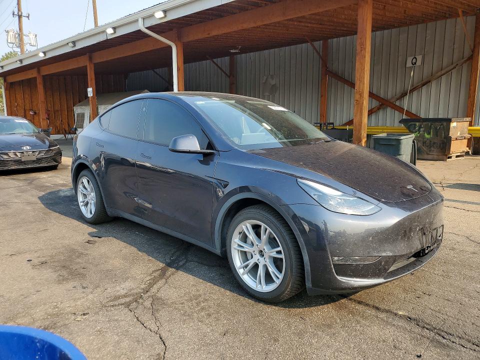2024 Tesla Model y VIN 7SAYGDEE4RF075361 COPART salvage auction — HAIL, Co - Certificate Of Title, sold $6,200 on 2026-07-28 (photo 4)