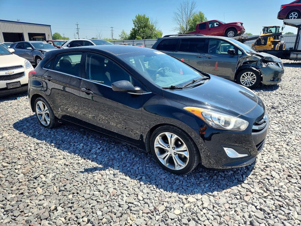 2013 Hyundai Elantra VIN KMHD35LE6DU123793 COPART salvage auction — MINOR DENT/SCRATCHES, WI - JUNKED VEHICLE BILL OF SALE, sold $600 on 2026-07-27 (photo 4)