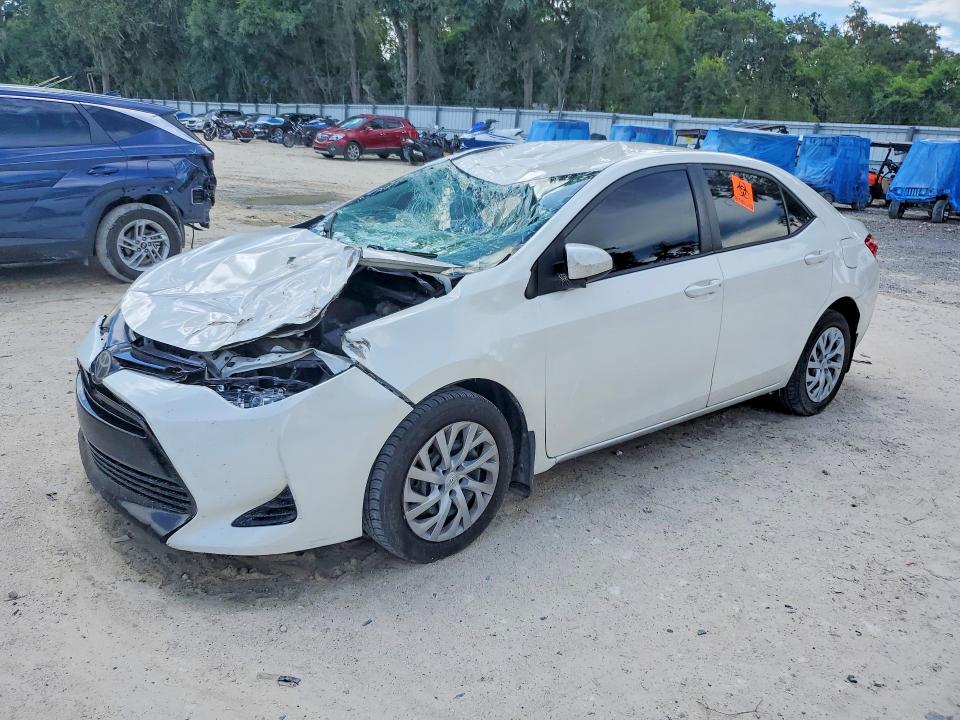 2017 Toyota Corolla VIN 5YFBURHE0HP669002 COPART salvage auction — FRONT END, Fl - Cert Of Title Slvg Rebuildable, sold $350 on 2026-07-28 (photo 1)