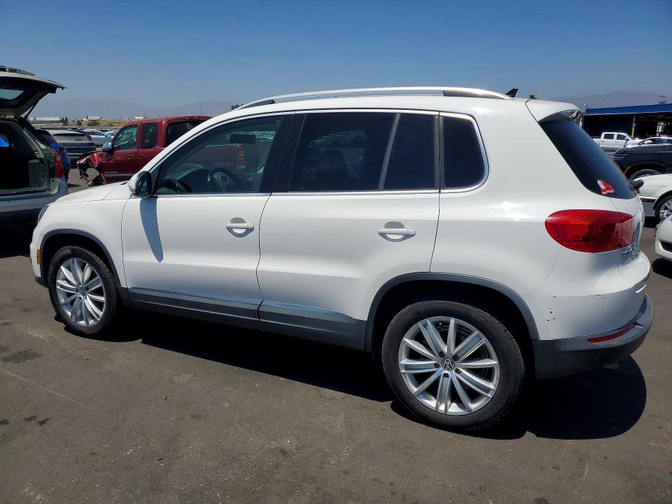 2012 Volkswagen Tiguan VIN WVGAV7AX5CW606224 COPART salvage auction — MINOR DENT/SCRATCHES, Ca - Dis/Dlr/Exp Only Clean Title (P), sold $600 on 2026-07-22 (photo 2)