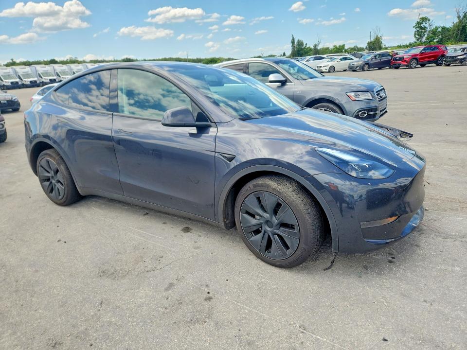 2024 Tesla Model y VIN 7SAYGDED5RF161043 COPART salvage auction — UNDERCARRIAGE, Fl - Certificate Of Title, sold $9,700 on 2026-07-21 (photo 4)