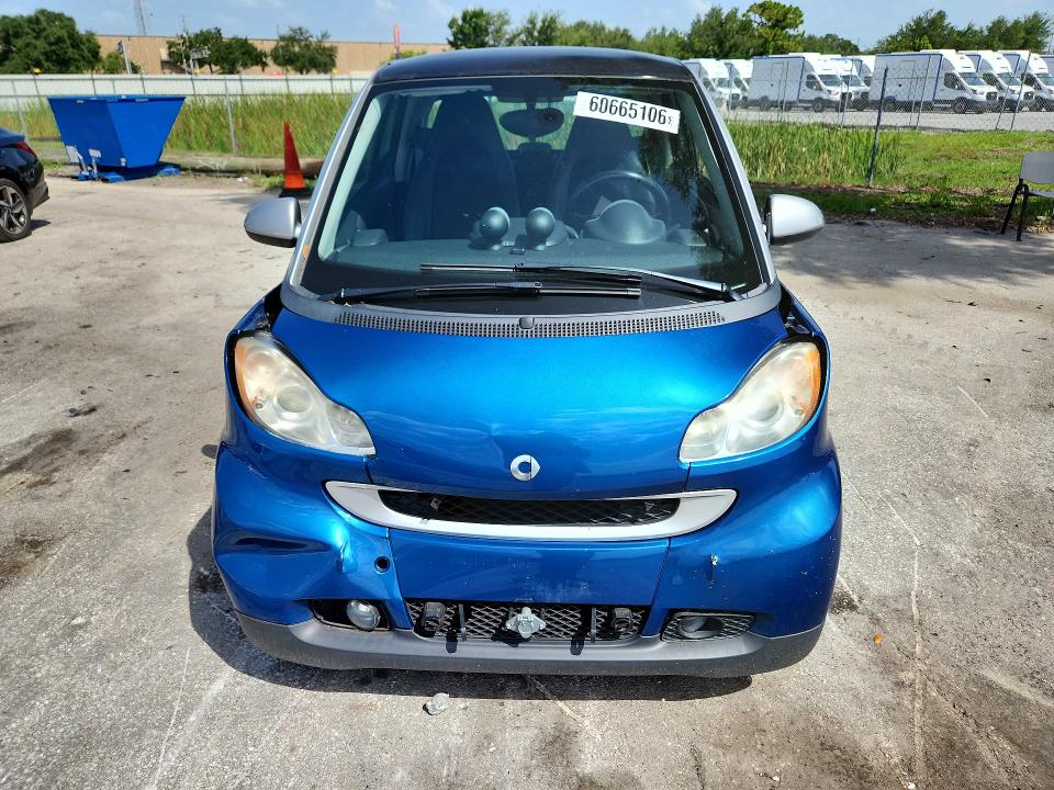 2009 Smart Fortwo VIN WMEEJ31X59K254712 COPART salvage auction — FRONT END, FL - CERT OF TITLE SLVG REBUILDABLE, sold $15 on 2026-07-21 (photo 5)
