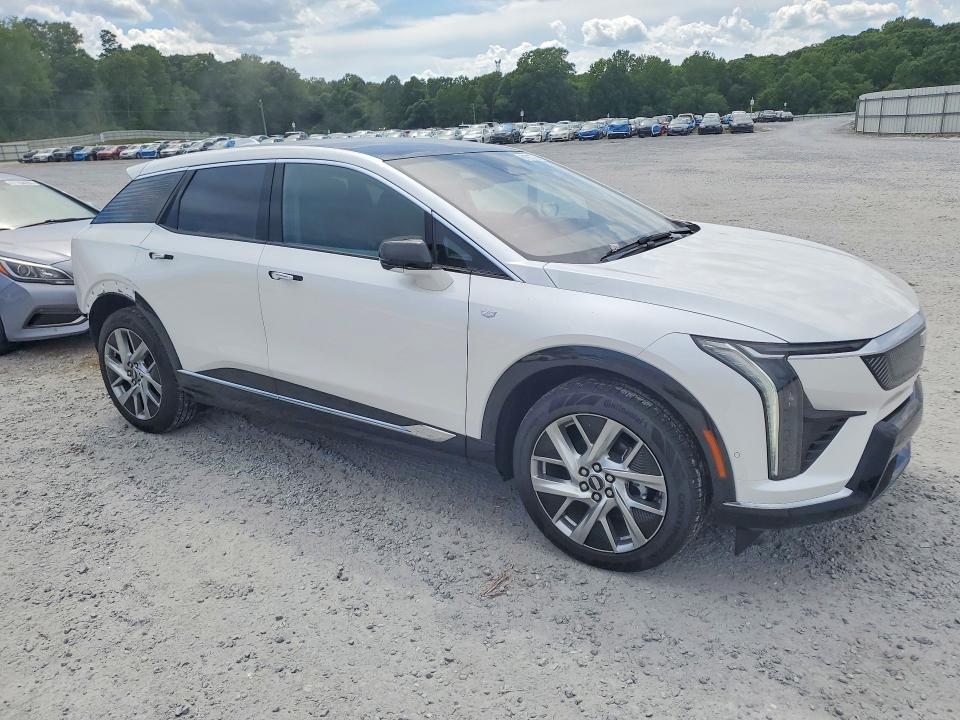 2025 Cadillac Optiq VIN 3GYK3DMR4SS216794 COPART salvage auction — REAR END, Nc - Salvage Certificate Of Title, sold $16,600 on 2026-08-19 (photo 4)