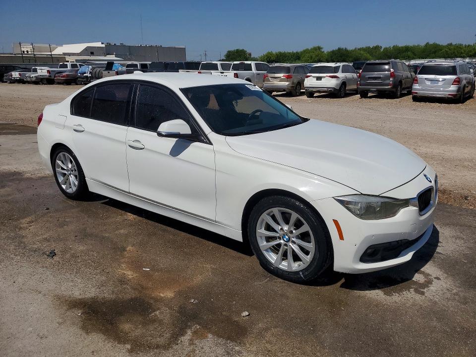 2017 BMW 3 series VIN WBA8E1G57HNU12939 COPART salvage auction — MINOR DENT/SCRATCHES, TX - CERT OF TITLE-REBUILT SALVAGE, sold $3,350 on 2026-07-22 (photo 4)