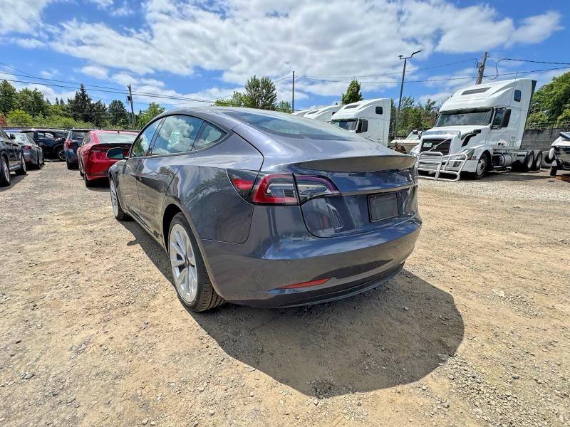 2022 Tesla Model 3 VIN 5YJ3E1EA5NF185418 COPART salvage auction — NORMAL WEAR, OR - CERTIFICATE OF TITLE (P), sold $22,300 on 2026-07-28 (photo 3)