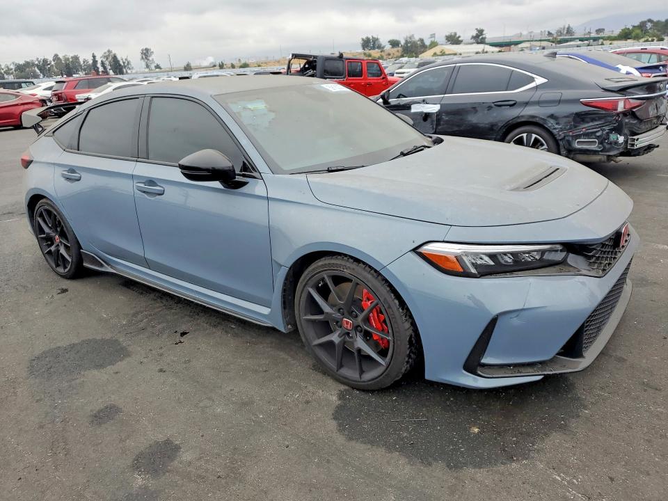 2025 Honda Civic VIN JHMFL5G45SX001449 COPART salvage auction — MINOR DENT/SCRATCHES, Ca - Salvage Certificate, sold $20,200 on 2026-07-29 (photo 4)