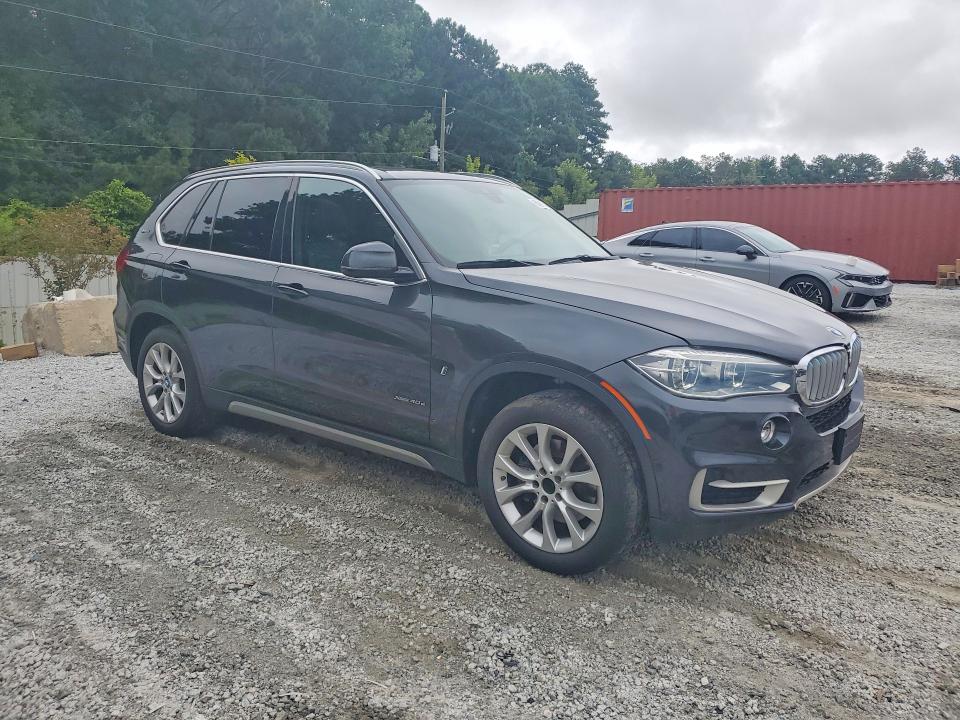2018 BMW X5 VIN 5UXKT0C5XJ0W00757 COPART salvage auction — MINOR DENT/SCRATCHES, Tn - Certificate Of Title, sold $2,600 on 2026-07-27 (photo 4)