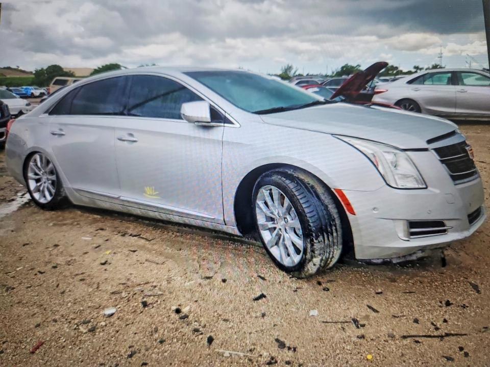2017 Cadillac Xts VIN 2G61M5S30H9106711 COPART salvage auction — WATER/FLOOD, FL - CERTIFICATE OF DESTRUCTION, sold $3,200 on 2026-09-01 (photo 4)
