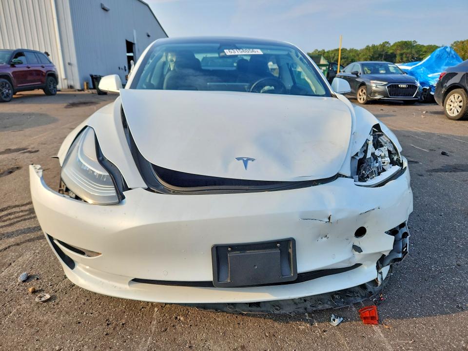 2020 Tesla Model 3 VIN 5YJ3E1EA2LF785231 COPART salvage auction — FRONT END, Fl - Cert Of Title Slvg Rebuildable, sold $4,750 on 2026-09-03 (photo 5)