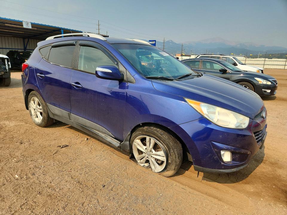 2013 Hyundai Tucson VIN KM8JUCAC0DU563577 COPART salvage auction — UNDERCARRIAGE, Co - Dis/Dlr/Exp Only Clean Title, sold $1,250 on 2026-07-20 (photo 4)