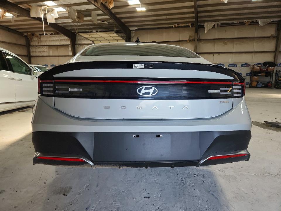 2026 Hyundai Sonata hybrid VIN KMHL24JJ3TA157974 COPART salvage auction — FRONT END, AZ - CERT OF TITLE- NON REPAIR (P), sold $7,400 on 2026-07-27 (photo 6)