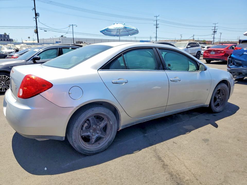 2009 Pontiac G6 VIN 1G2ZG57B494151263 COPART salvage auction — MINOR DENT/SCRATCHES, Ca - Dis/Dlr/Exp Clean W/Salv Hist, sold $225 on 2026-07-27 (photo 3)