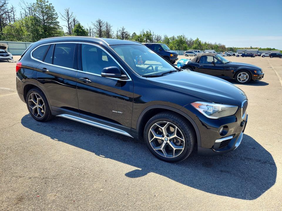 2018 BMW X1 VIN WBXHT3C37J5F89916 COPART salvage auction — REAR END, Ny - Mv-907A Salvage Certificate, sold $4,100 on 2026-07-13 (photo 4)