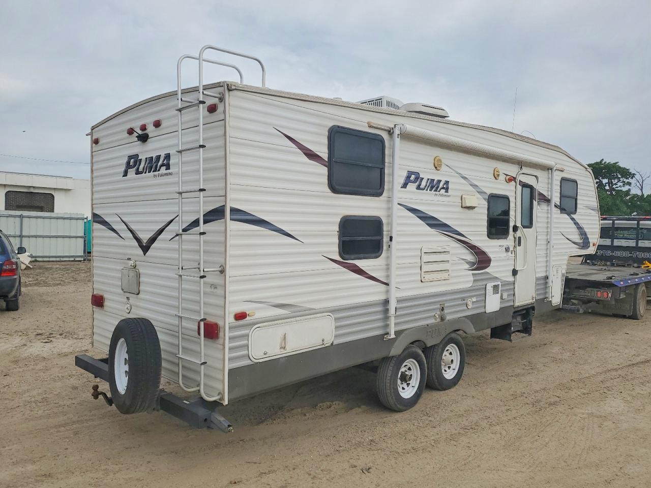 2012 Palomino Pum259rbss VIN 4X4FPUA27CP036724 COPART salvage auction — Hail, KS - CERT OF TITLE-SALVAGE (P), sold $3,150 on 2026-07-09 (photo 4)