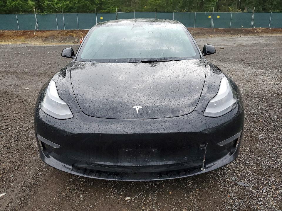2022 Tesla Model 3 VIN 5YJ3E1EA2NF287999 COPART salvage auction — REAR END, Wa - Vehicle Cert Of Ownership-Titl, sold $125 on 2026-07-27 (photo 5)