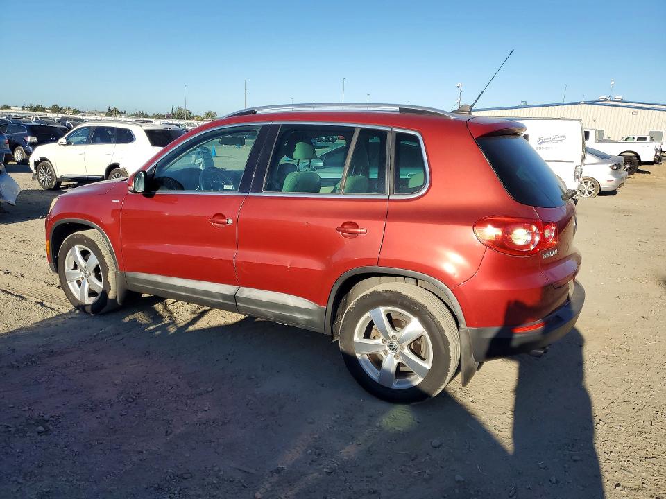 2010 Volkswagen Tiguan VIN WVGAV7AX4AW002306 COPART salvage auction — MINOR DENT/SCRATCHES, CA - DIS/DLR/EXP ONLY CLEAN TITLE, sold $275 on 2026-08-04 (photo 2)