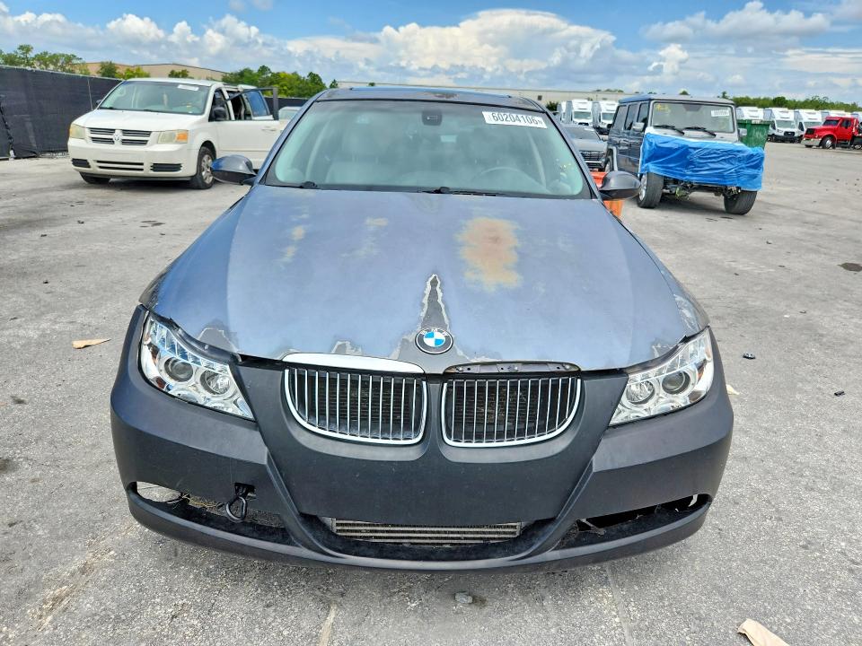 2007 BMW 3 series VIN WBAVB73517PA86582 COPART salvage auction — MINOR DENT/SCRATCHES, FL - CERT OF TITLE-REBUILT, sold $500 on 2026-07-21 (photo 5)