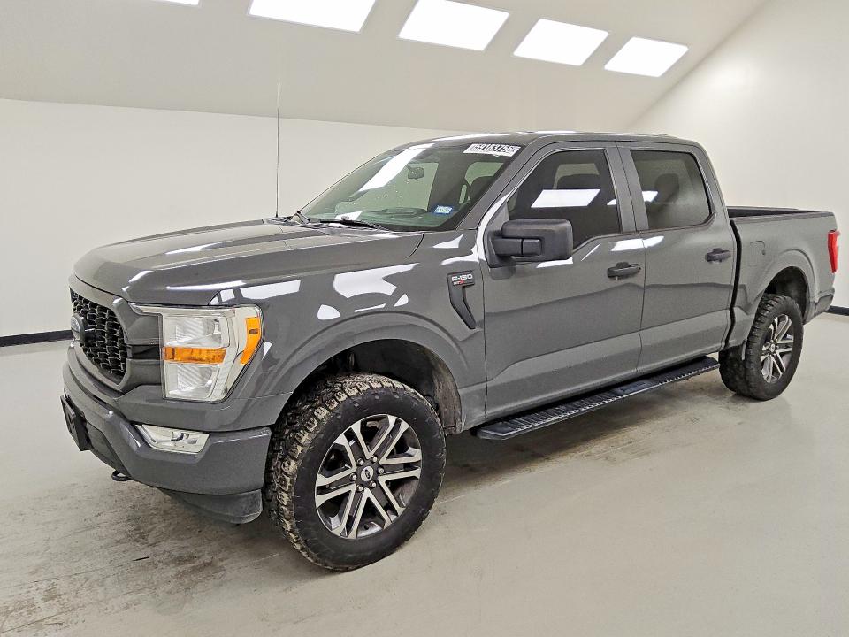 2021 Ford F-150 lightning VIN 1FTFW1E52MKD65101 — COPART salvage auction photo