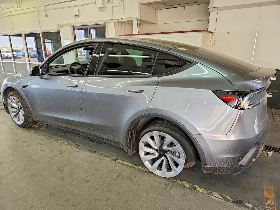 2026 Tesla Model y VIN 7SAYGDEE9TF331503 COPART salvage auction — SIDE, WA - BILL OF SALE, sold $19,100 on 2026-07-31 (photo 2)
