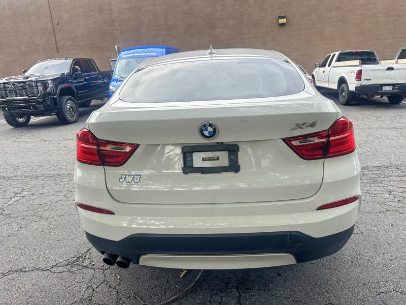 2016 BMW X4 VIN 5UXXW3C51G0M89913 COPART salvage auction — SIDE, Va - Certificate Of Title (P), sold $4,200 on 2026-07-11 (photo 4)
