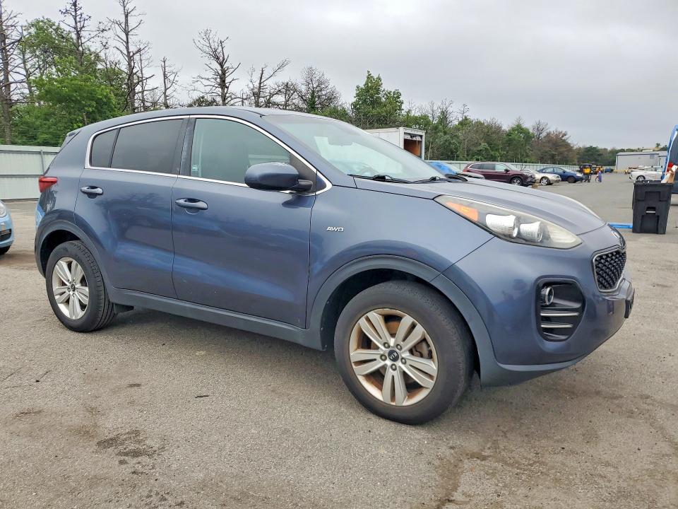 2017 Kia Sportage VIN KNDPMCAC5H7117637 COPART salvage auction — MINOR DENT/SCRATCHES, NY - CERTIFICATE OF TITLE, sold $2,850 on 2026-07-27 (photo 4)