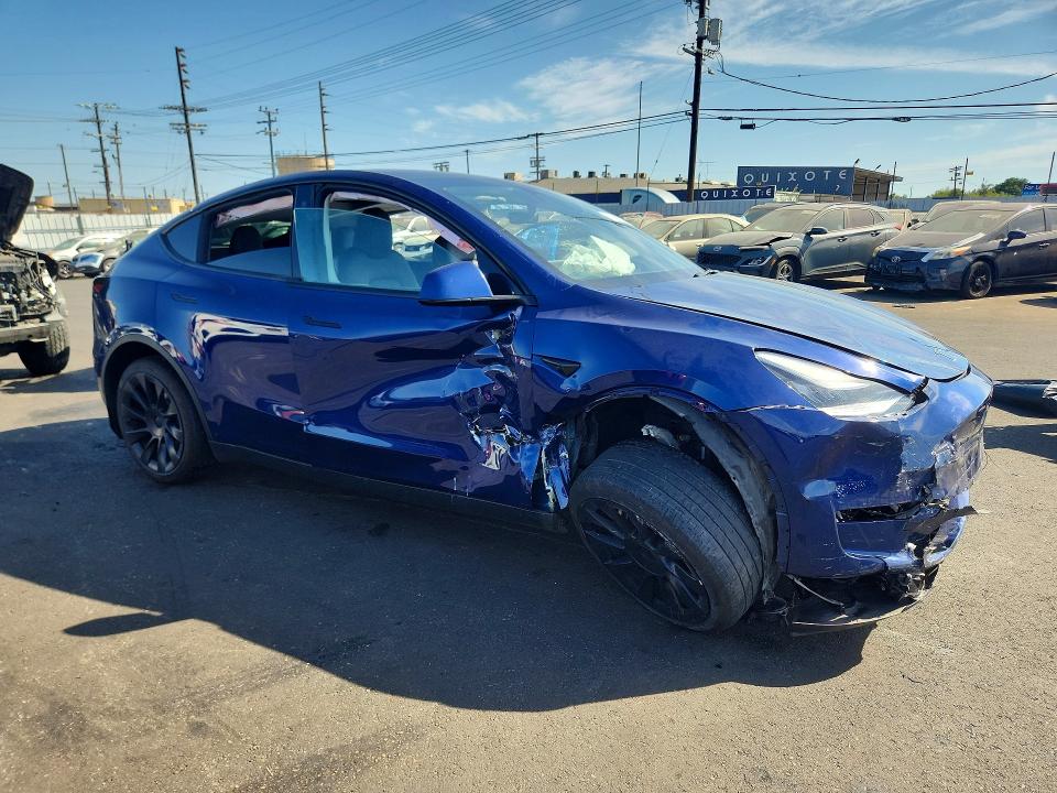 2023 Tesla Model y VIN 7SAYGDEE1PA124414 COPART salvage auction — FRONT END, CA - SALVAGE CERTIFICATE, sold $4,850 on 2026-07-27 (photo 4)