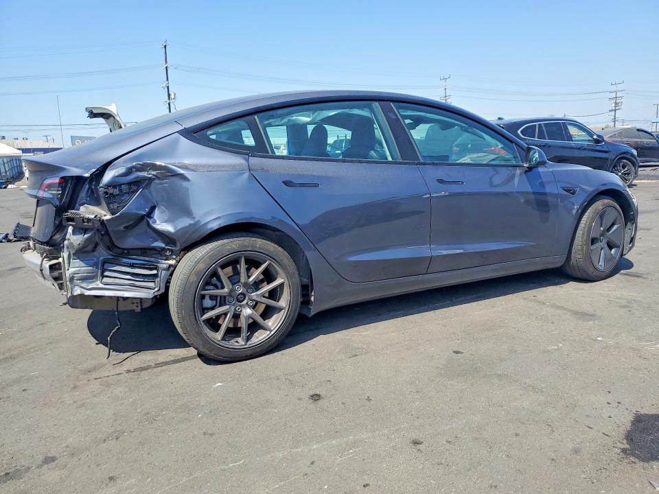 2023 Tesla Model 3 VIN 5YJ3E1EAXPF433018 COPART salvage auction — REAR END, Ca - Salvage Certificate, sold $7,100 on 2026-07-27 (photo 3)