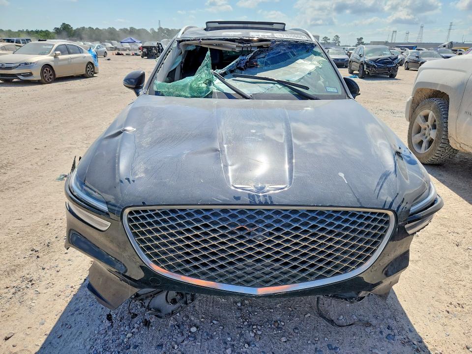 2023 Genesis Gv70 VIN KMUMADTB4PU138675 COPART salvage auction — ROLLOVER, Tx - Salvage Vehicle Title (P), sold $3,950 on 2026-07-10 (photo 5)
