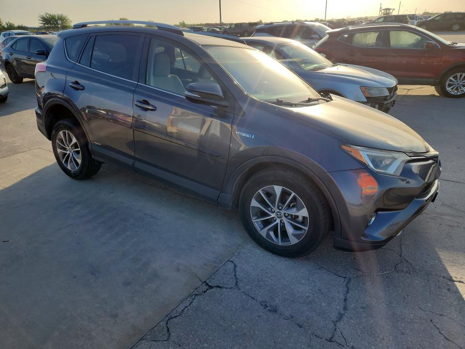 2016 Toyota Rav 4 VIN JTMRJREV9GD015189 COPART salvage auction — SIDE, Tx - Salvage Vehicle Title, sold $175 on 2026-07-27 (photo 4)