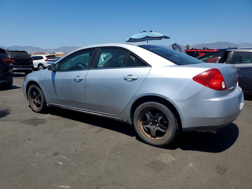 2009 Pontiac G6 VIN 1G2ZG57B494151263 COPART salvage auction — MINOR DENT/SCRATCHES, Ca - Dis/Dlr/Exp Clean W/Salv Hist, sold $225 on 2026-07-27 (photo 2)