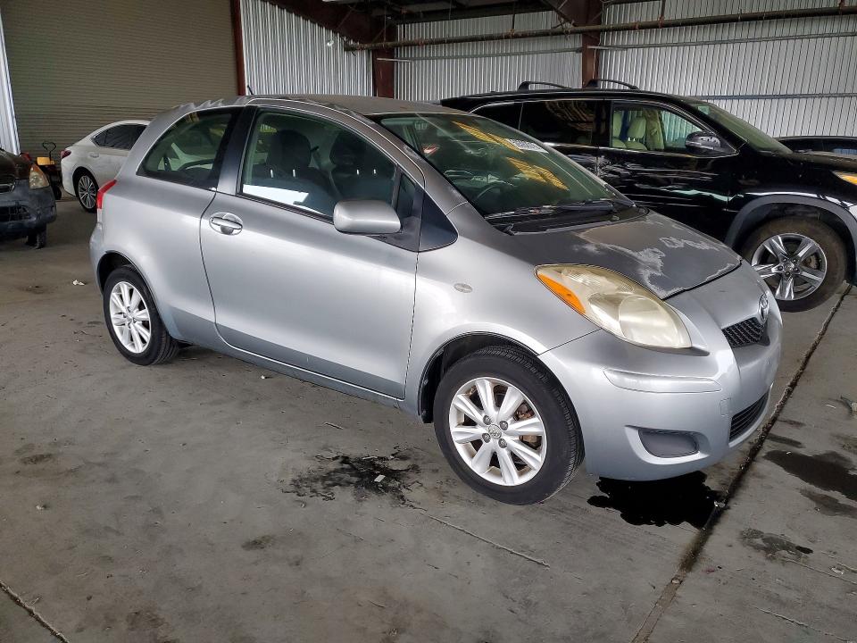 2011 Toyota Yaris VIN JTDJT4K36B5337014 COPART salvage auction — ROOF, CA - DIS/DLR/EXP ONLY CLEAN TITLE, sold $2,250 on 2026-07-16 (photo 4)