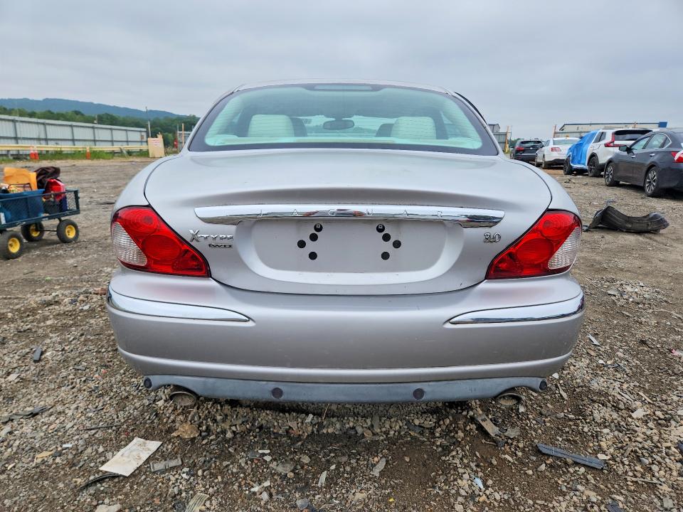 2004 Jaguar X type VIN SAJEA51C84WD67325 COPART salvage auction — SIDE, Va - Certificate Of Title, sold $300 on 2026-07-31 (photo 6)
