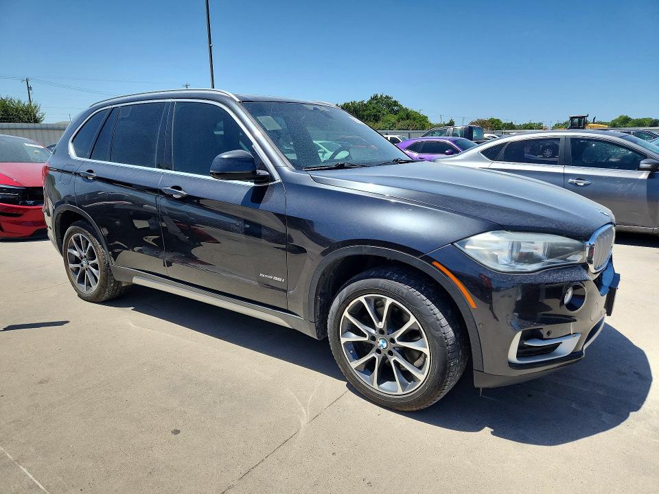 2018 BMW X5 VIN 5UXKR2C51J0Z22102 COPART salvage auction — MINOR DENT/SCRATCHES, Tx - Certificate Of Title, sold $6,900 on 2026-07-30 (photo 4)