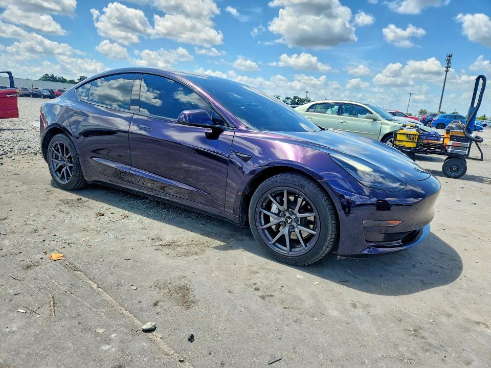 2019 Tesla Model 3 VIN 5YJ3E1EB4KF469112 COPART salvage auction — REAR END, Fl - Cert Of Title Slvg Rebuildable, sold $8,800 on 2026-07-15 (photo 4)