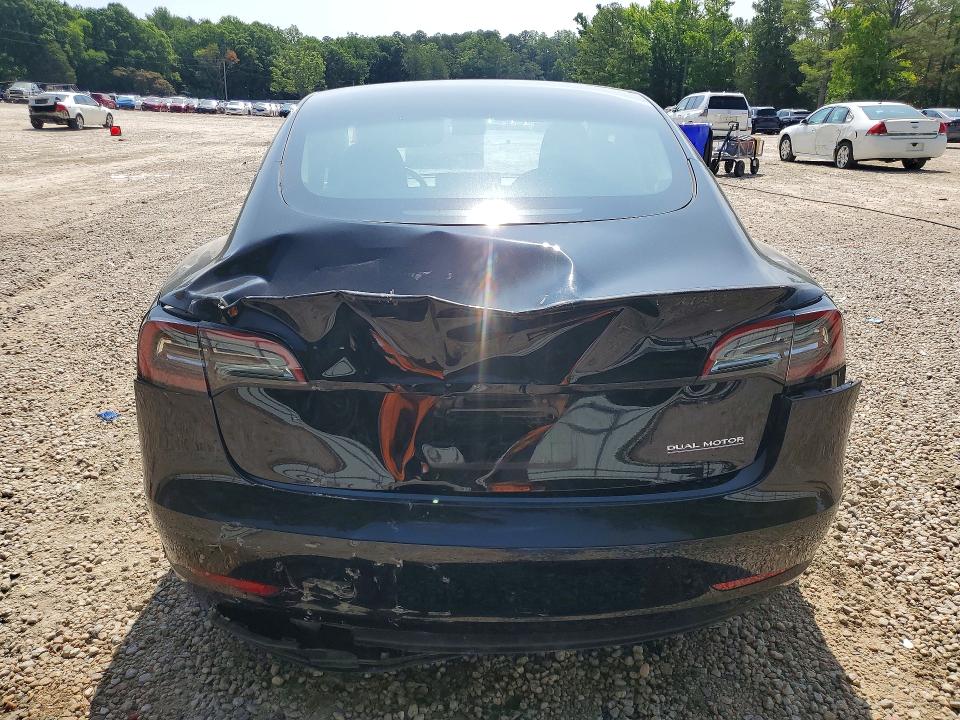 2023 Tesla Model 3 VIN 5YJ3E1EC6PF675483 COPART salvage auction — REAR END, NC - SALVAGE CERTIFICATE OF TITLE, sold $9,100 on 2026-07-31 (photo 6)